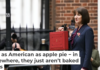 The obligatory showing of the red briefcase containing budget details is as exciting as it gets in the U.K. Justin Tallis - WPA Pool/Getty Images
